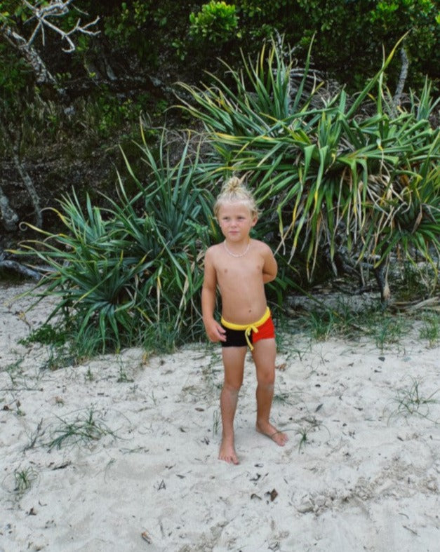 neptune swim trunks | yellow / chilli/ black